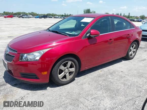 2014 Chevrolet Cruze 1LT z VIN 1G1PC5SBXE7232873, wystawiony jako IAAI lot #43091313 z przebiegiem 109 702 mil mil oraz . Historia ofert i sprzedaży dostępna na DreamBid. Obrazek 2.