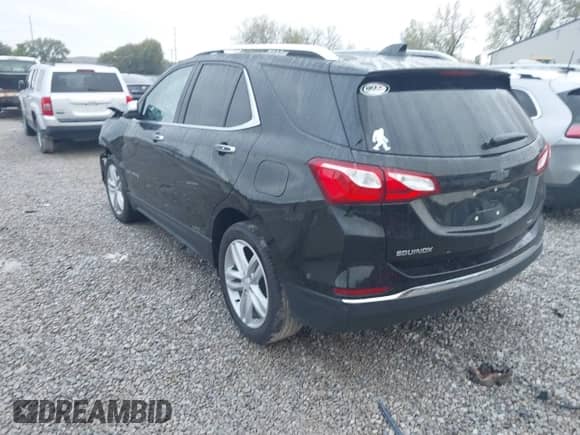 2018 Chevrolet Equinox Premier with VIN 2GNAXVEV8J6207981, listed as a IAAI auction lot 43276759 with 90,288 mi miles and . Bid and sale history available at DreamBid. Image 3.