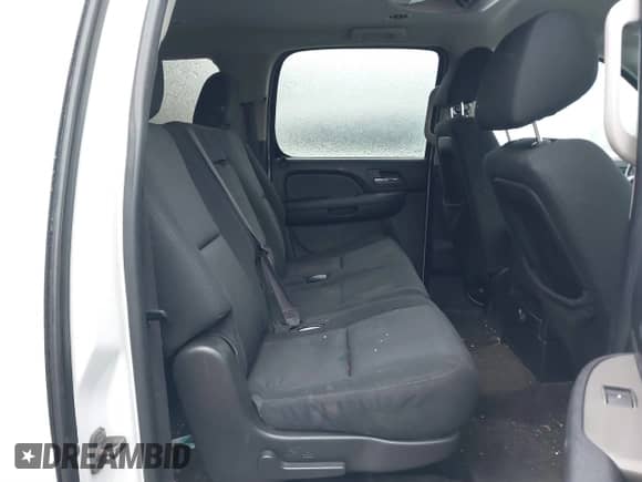 2012 Chevrolet Suburban z VIN 1GNSK5E77CR114350, wystawiony jako IAAI lot #41507100 z przebiegiem 180 095 mil mil oraz . Historia ofert i sprzedaży dostępna na DreamBid. Obrazek 8.