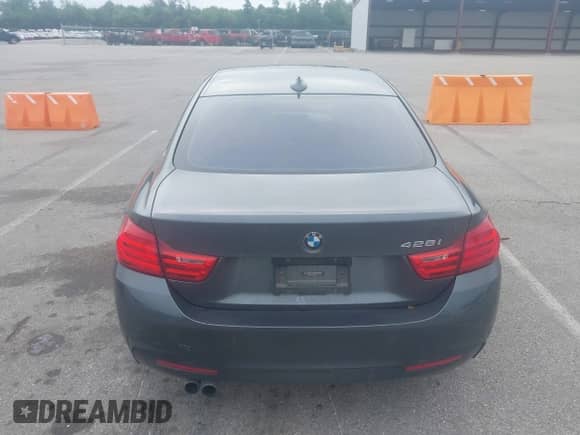 2014 BMW 4 Series 428i z VIN WBA3N7C52EK221929, wystawiony jako IAAI lot #42530110 z przebiegiem 126 828 mil mil oraz . Historia ofert i sprzedaży dostępna na DreamBid. Obrazek 16.
