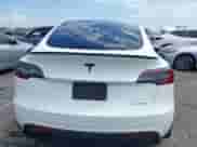 2023 Tesla Model Y Long Range with VIN 7SAYGDEE7PA124885, listed as a IAAI auction lot 43084065 with 22,983 mi miles and . Bid and sale history available at DreamBid. Image 17.