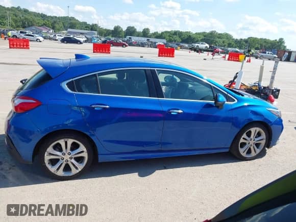 2017 Chevrolet Cruze Premier z VIN 3G1BF6SM3HS560456, wystawiony jako IAAI lot #42542260 z przebiegiem 156 855 mil mil oraz . Historia ofert i sprzedaży dostępna na DreamBid. Obrazek 13.