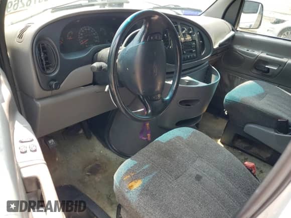 1999 Ford Econoline Cargo z VIN 1FDNS24L2XHB77253, wystawiony jako Copart lot #59782695 z przebiegiem 272 196 mil mil oraz Czysty tytuł • Clean title. Historia ofert i sprzedaży dostępna na DreamBid. Obrazek 8.