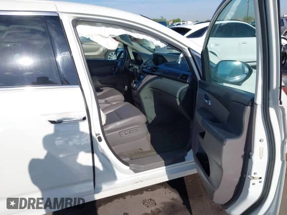 2015 Honda Odyssey Touring Elite с VIN 5FNRL5H94FB052272, выставлен на аукционе IAAI как лот 43040692 с пробегом 134 921 миль миль и . История ставок и продаж доступна на DreamBid. Изображение 5.