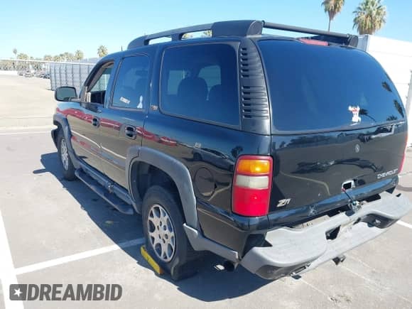 2003 Chevrolet Tahoe Z71 z VIN 1GNEK13T63R134594, wystawiony jako IAAI lot #43429932 z przebiegiem 237 653 mil mil oraz . Historia ofert i sprzedaży dostępna na DreamBid. Obrazek 3.