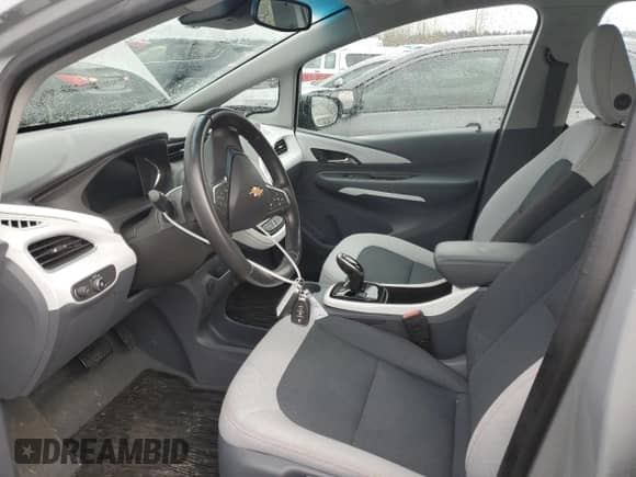 2020 Chevrolet Bolt EV LT z VIN 1G1FY6S07L4112268, wystawiony jako Copart lot #40060623 z przebiegiem 34 578 mil mil oraz . Historia ofert i sprzedaży dostępna na DreamBid. Obrazek 7.