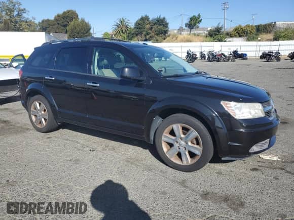 2010 Dodge Journey R/T with VIN 3D4PG6FV1AT120798, listed as a Copart auction lot 68300765 with 106,417 mi miles and Salvage title. Bid and sale history available at DreamBid. Image 4.