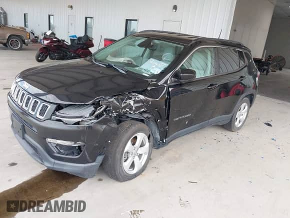 2021 Jeep Compass Altitude with VIN 3C4NJCBB6MT576896, listed as a IAAI auction lot 38196327 with 38,367 mi miles and . Bid and sale history available at DreamBid. Image 2.