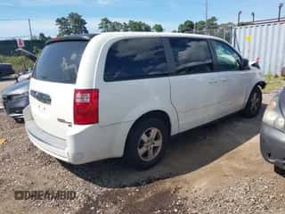2009 Dodge Grand Caravan SE with VIN 2D8HN44E19R575827, listed as a IAAI auction lot 42812571 with 165,084 mi miles and . Bid and sale history available at DreamBid. Image 4.