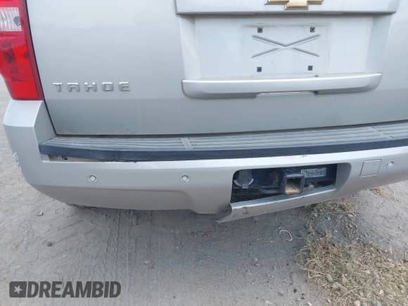 2007 Chevrolet Tahoe LTZ with VIN 1GNFK130X7R307842, listed as a IAAI auction lot 42961224 with 180,754 mi miles and . Bid and sale history available at DreamBid. Image 14.