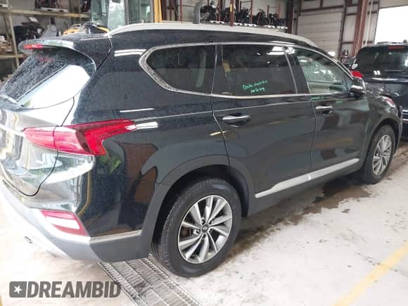 2020 Hyundai Santa Fe SEL with VIN 5NMS3CAD3LH235273, listed as a IAAI auction lot 42751375 with 83,256 mi miles and . Bid and sale history available at DreamBid. Image 4.