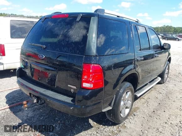 2005 Ford Explorer XLT with VIN 1FMZU73W25UA54769, listed as a IAAI auction lot 43304452 with 214,187 mi miles and . Bid and sale history available at DreamBid. Image 4.