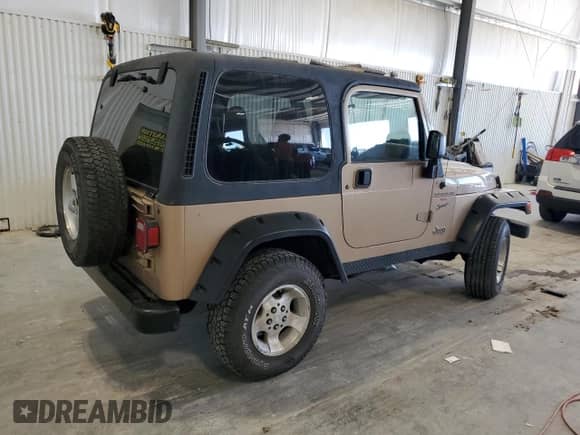 1999 Jeep Wrangler Sport with VIN 1J4FY19S6XP430964, listed as a Copart auction lot 85937775 with 109,444 mi miles and Clean title. Bid and sale history available at DreamBid. Image 3.