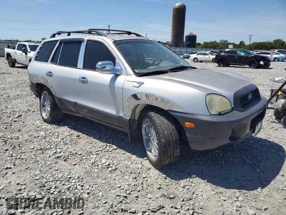 2001 Hyundai Santa Fe GLS z VIN KM8SC83D31U029432, wystawiony jako Copart lot #70366715 z przebiegiem Nie podano mil oraz Szkoda całkowita • Salvage title. Historia ofert i sprzedaży dostępna na DreamBid. Obrazek 4.
