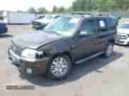 2007 Mercury Mariner Premier with VIN 4M2CU971X7KJ11054, listed as a IAAI auction lot 42813499 with 151,165 mi miles and . Bid and sale history available at DreamBid. Image 2.