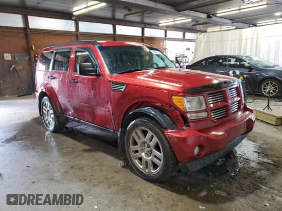 2011 Dodge Nitro Heat with VIN 1D4PU4GX3BW501092, listed as a Copart auction lot 68682015 with 124,694 mi miles and Salvage title. Bid and sale history available at DreamBid. Image 4.
