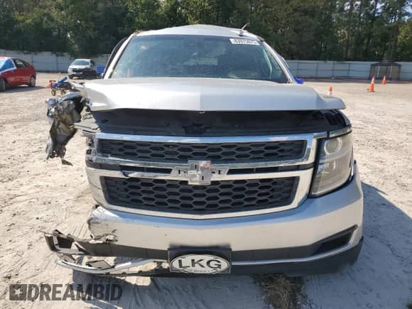 2018 Chevrolet Suburban LT with VIN 1GNSCHKC9JR237158, listed as a Copart auction lot 83975075 with 142,981 mi miles and Salvage title. Bid and sale history available at DreamBid. Image 5.