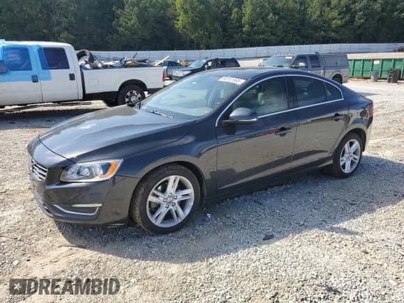 2015 Volvo S60 T5 Drive-E Premier with VIN YV140MFK0F1352395, listed as a Copart auction lot 80151995 with 152,034 mi miles and Salvage title. Bid and sale history available at DreamBid. Image 1.