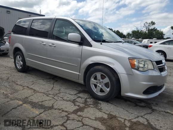 2011 Dodge Grand Caravan Mainstreet with VIN 2D4RN3DG3BR732832, listed as a Copart auction lot 62834335 with 172,565 mi miles and Salvage title. Bid and sale history available at DreamBid. Image 4.