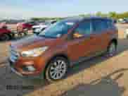 2017 Ford Escape Titanium с VIN 1FMCU0JD3HUA00223, выставлен на аукционе Copart как лот 71180025 с пробегом 115 875 миль миль и Чистый • Clean title. История ставок и продаж доступна на DreamBid. Изображение 1.