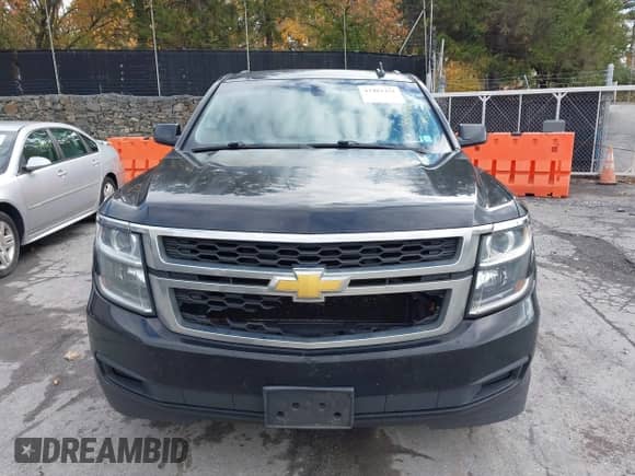 2015 Chevrolet Tahoe LS z VIN 1GNSKAKC6FR578745, wystawiony jako IAAI lot #43481431 z przebiegiem 452 330 mil mil oraz . Historia ofert i sprzedaży dostępna na DreamBid. Obrazek 12.