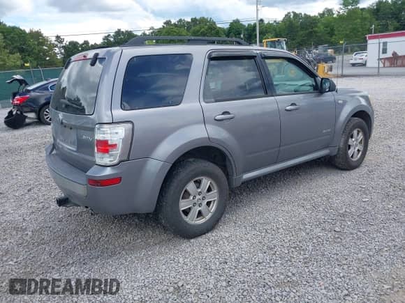 2008 Mercury Mariner with VIN 4M2CU91178KJ14388, listed as a IAAI auction lot 42973382 with 219,954 mi miles and . Bid and sale history available at DreamBid. Image 4.
