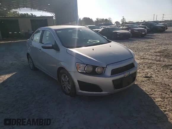 2012 Chevrolet Sonic LT с VIN 1G1JC5SH8C4105712, выставлен на аукционе Copart как лот 84606115 с пробегом 233 577 миль миль и Списание • Salvage title. История ставок и продаж доступна на DreamBid. Изображение 13.