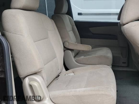 2012 Honda Odyssey LX z VIN 5FNRL5H28CB094801, wystawiony jako Copart lot #81809875 z przebiegiem 161 866 mil mil oraz Szkoda całkowita • Salvage title. Historia ofert i sprzedaży dostępna na DreamBid. Obrazek 11.