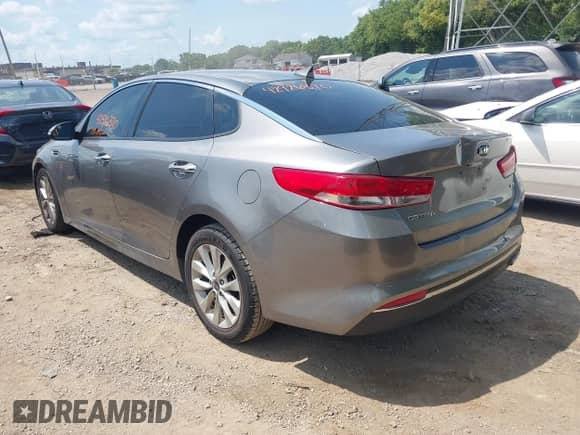 2016 Kia Optima EX z VIN 5XXGU4L32GG098747, wystawiony jako IAAI lot #42926370 z przebiegiem 132 197 mil mil oraz . Historia ofert i sprzedaży dostępna na DreamBid. Obrazek 3.