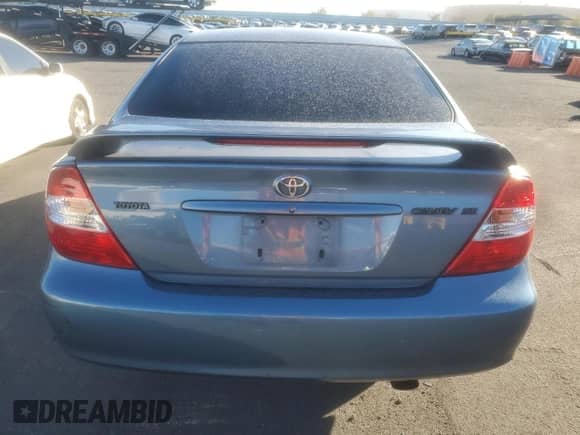 2004 Toyota Camry LE with VIN JTDBE32K040253478, listed as a Copart auction lot 90079455 with 248,286 mi miles and Clean title. Bid and sale history available at DreamBid. Image 6.