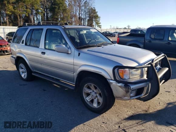 2003 Nissan Pathfinder LE with VIN JN8DR09Y43W800385, listed as a Copart auction lot 41414575 with 238,777 mi miles and Salvage title. Bid and sale history available at DreamBid. Image 4.