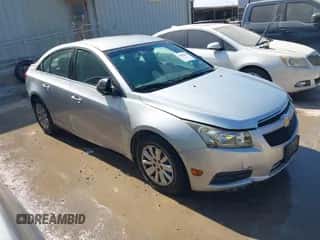 2011 Chevrolet Cruze LS z VIN 1G1PC5SH7B7299303, wystawiony jako IAAI lot #43402273 z przebiegiem 114 284 mil mil oraz . Historia ofert i sprzedaży dostępna na DreamBid. Obrazek 1.