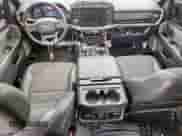 2023 Ford F-150 XL with VIN 1FTEW1E83PFB44870, listed as a Copart auction lot 67404595 with 69,006 mi miles and Salvage title. Bid and sale history available at DreamBid. Image 8.