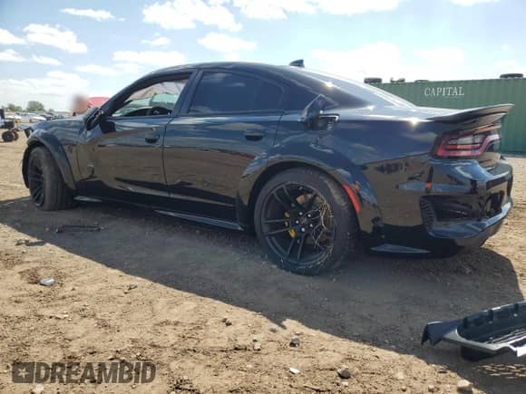 2023 Dodge Charger SRT Hellcat Redeye Widebody with VIN 2C3CDXL92PH520716, listed as a Copart auction lot 71207485 with 7,869 mi miles and Salvage title. Bid and sale history available at DreamBid. Image 2.