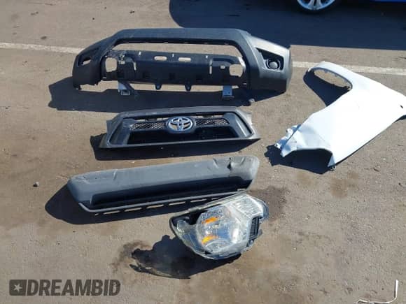 2015 Toyota Tacoma with VIN 5TFTX4CN9FX064299, listed as a IAAI auction lot 43530621 with 104,520 mi miles and . Bid and sale history available at DreamBid. Image 12.