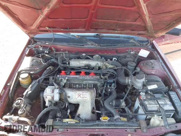 1991 Toyota Camry DLX z VIN 4T1SV21EXMU354893, wystawiony jako IAAI lot #43414642 z przebiegiem 135 939 mil mil oraz . Historia ofert i sprzedaży dostępna na DreamBid. Obrazek 10.