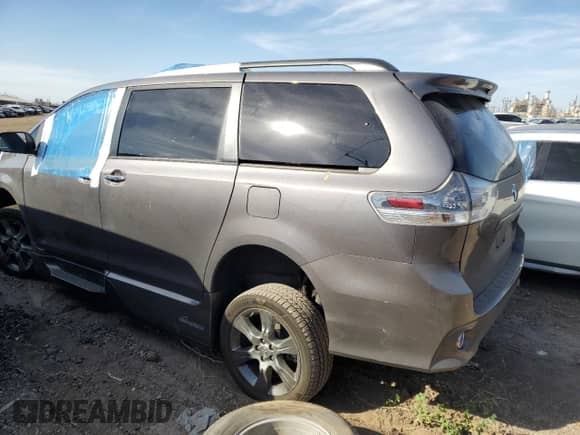 2015 Toyota Sienna SE with VIN 5TDXK3DC5FS642718, listed as a Copart auction lot 57339825 with 66,969 mi miles and Salvage title. Bid and sale history available at DreamBid. Image 2.