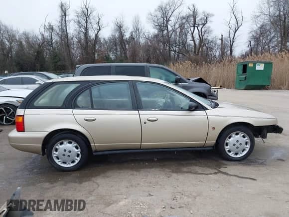 1997 Saturn SW with VIN 1G8ZK8270VZ205793, listed as a IAAI auction lot 41609103 with 120,754 mi miles and . Bid and sale history available at DreamBid. Image 14.