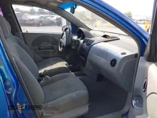 2005 Chevrolet Aveo LT z VIN KL1TG62695B349450, wystawiony jako IAAI lot #43335143 z przebiegiem 221 580 mil mil oraz . Historia ofert i sprzedaży dostępna na DreamBid. Obrazek 5.