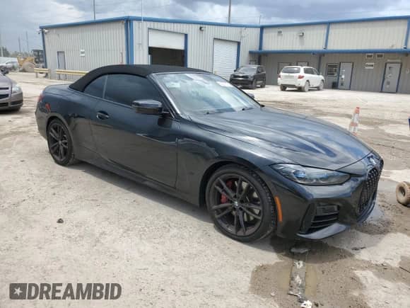 2022 BMW 4 Series M440i with VIN WBA53AT06NCK11740, listed as a Copart auction lot 63387673 with 10,184 mi miles and . Bid and sale history available at DreamBid. Image 4.
