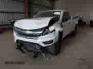 2019 Chevrolet Colorado 2WD Work Truck with VIN 1GCHSBEAXK1332888, listed as a IAAI auction lot 43367778 with 60,024 mi miles and . Bid and sale history available at DreamBid. Image 2.