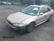 2002 Honda Accord EX with VIN 1HGCG16552A054717, listed as a IAAI auction lot 43300453 with 208,960 mi miles and . Bid and sale history available at DreamBid. Image 2.