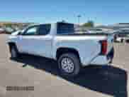 2024 Toyota Tacoma SR5 z VIN 3TMKB5FN9RM005162, wystawiony jako Copart lot #69293865 z przebiegiem 24 456 mil mil oraz Szkoda całkowita • Salvage title. Historia ofert i sprzedaży dostępna na DreamBid. Obrazek 2.