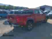 2015 Chevrolet Colorado 4WD LT z VIN 1GCGTBE31F1184744, wystawiony jako IAAI lot #42988122 z przebiegiem 122 987 mil mil oraz . Historia ofert i sprzedaży dostępna na DreamBid. Obrazek 4.