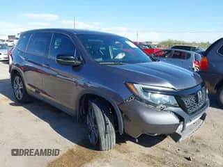 2021 Honda Passport EX-L with VIN 5FNYF7H52MB001975, listed as a IAAI auction lot 42903727 with 59,459 mi miles and . Bid and sale history available at DreamBid. Image 1.