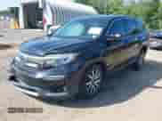 2020 Honda Pilot EX-L z VIN 5FNYF6H57LB033099, wystawiony jako IAAI lot #42588491 z przebiegiem 135 945 mil mil oraz . Historia ofert i sprzedaży dostępna na DreamBid. Obrazek 2.