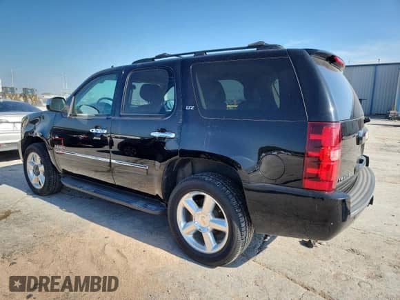2014 Chevrolet Tahoe LTZ с VIN 1GNSKCE09ER116627, выставлен на аукционе Copart как лот 64214685 с пробегом 240 970 миль миль и Чистый • Clean title. История ставок и продаж доступна на DreamBid. Изображение 2.
