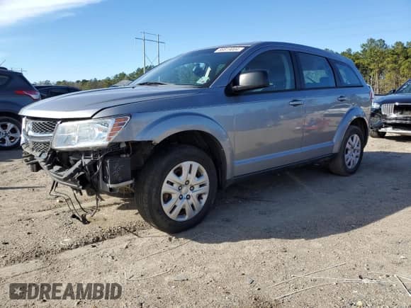 2015 Dodge Journey SE with VIN 3C4PDCAB5FT737517, listed as a Copart auction lot 86819004 with Not provided miles and Salvage title. Bid and sale history available at DreamBid. Image 1.