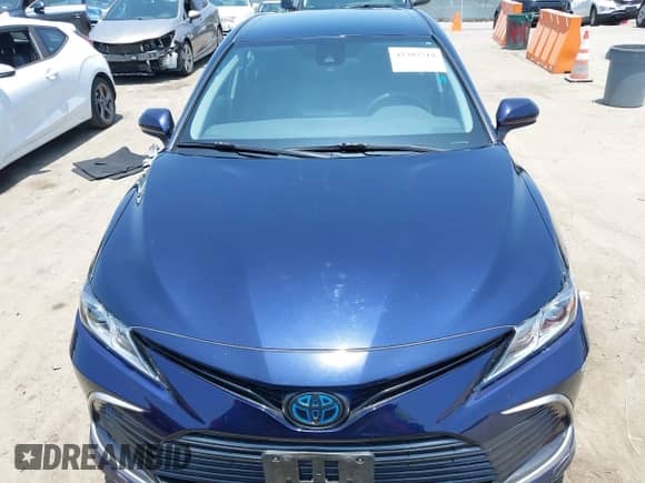 2022 Toyota Camry Hybrid LE with VIN 4T1C31AK0NU576130, listed as a IAAI auction lot 42382718 with 70,749 mi miles and . Bid and sale history available at DreamBid. Image 12.