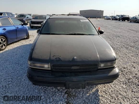 1996 Chevrolet Caprice z VIN 1G1BL82P2TR106404, wystawiony jako Copart lot #74213214 z przebiegiem 156 588 mil mil oraz Szkoda całkowita • Salvage title. Historia ofert i sprzedaży dostępna na DreamBid. Obrazek 5.